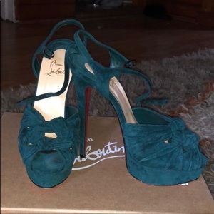 Green suede Christian Louboutin heels.